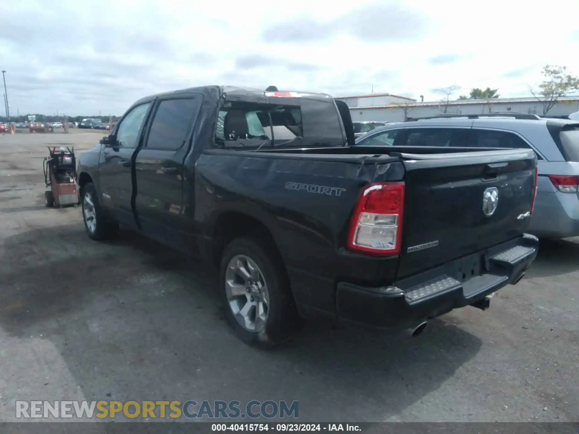 3 Photograph of a damaged car 1C6SRFFT5MN778054 RAM 1500 2021