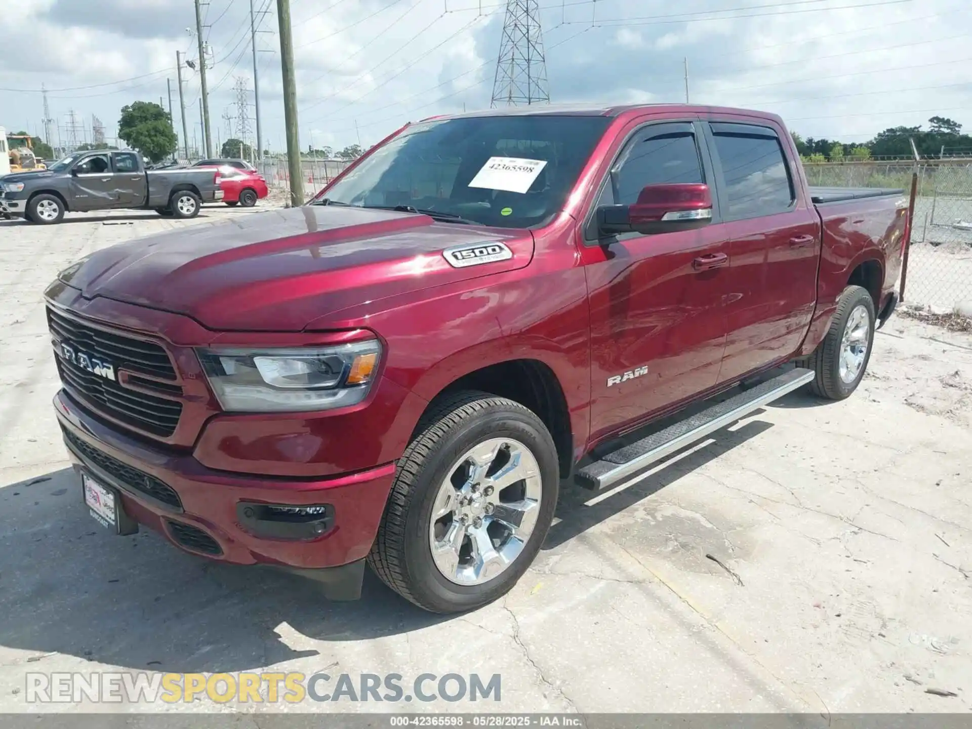 2 Photograph of a damaged car 1C6SRFFT6MN533571 RAM 1500 2021
