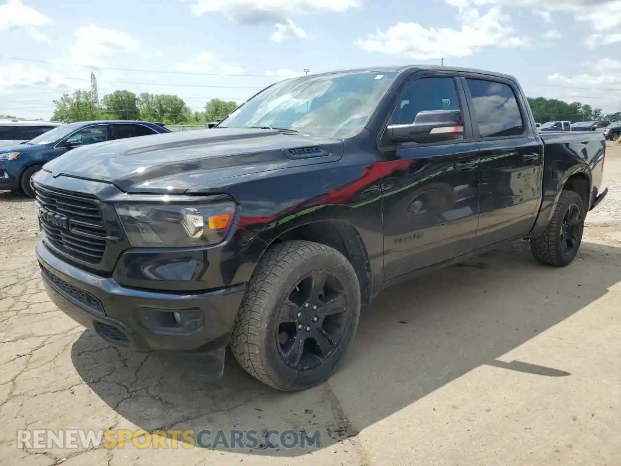 1 Photograph of a damaged car 1C6SRFFT6MN555666 RAM 1500 2021