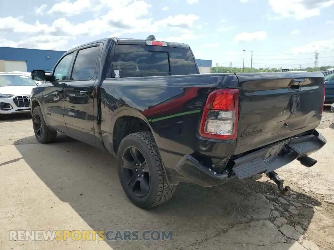 2 Photograph of a damaged car 1C6SRFFT6MN555666 RAM 1500 2021
