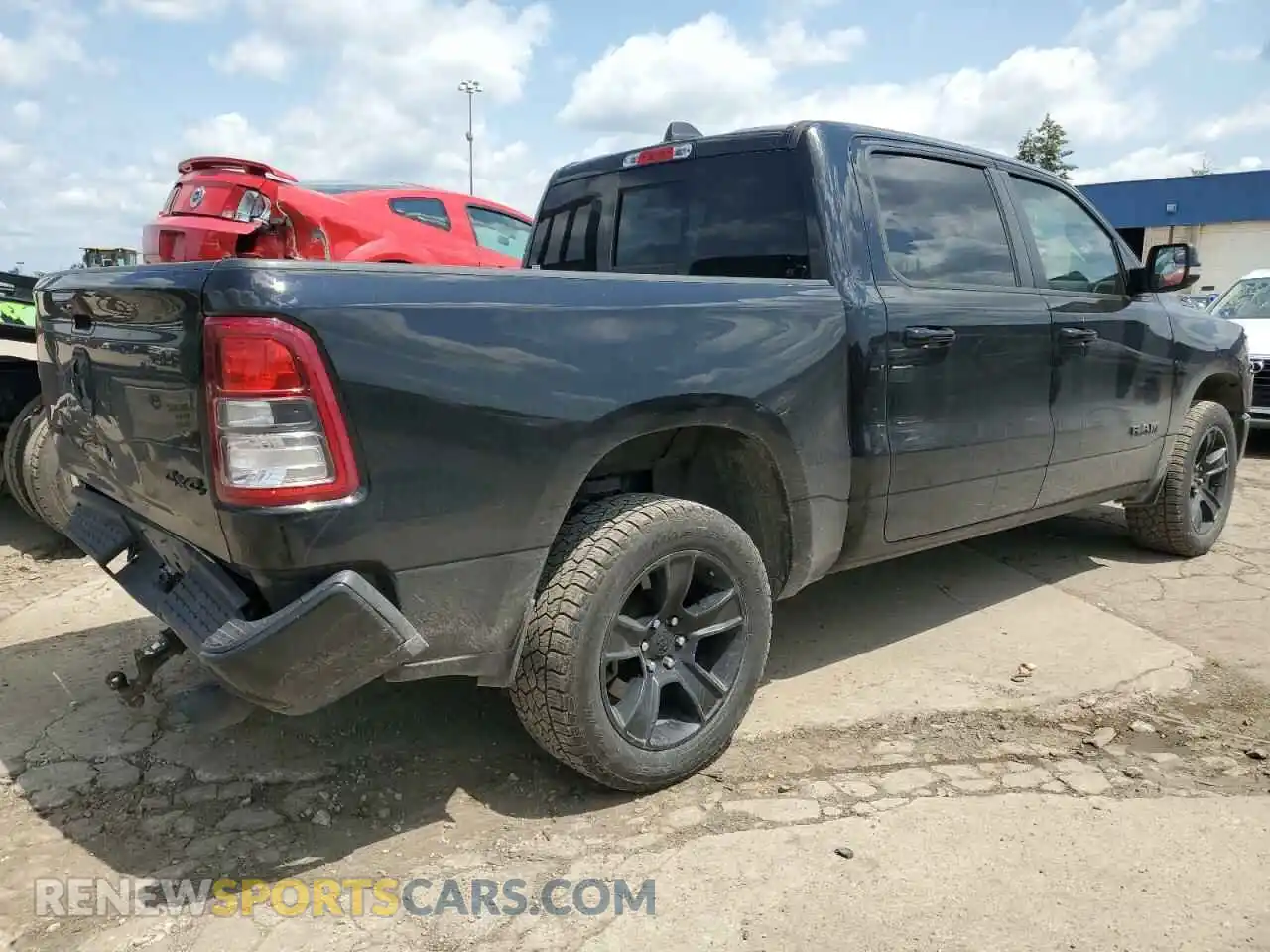 3 Photograph of a damaged car 1C6SRFFT6MN555666 RAM 1500 2021