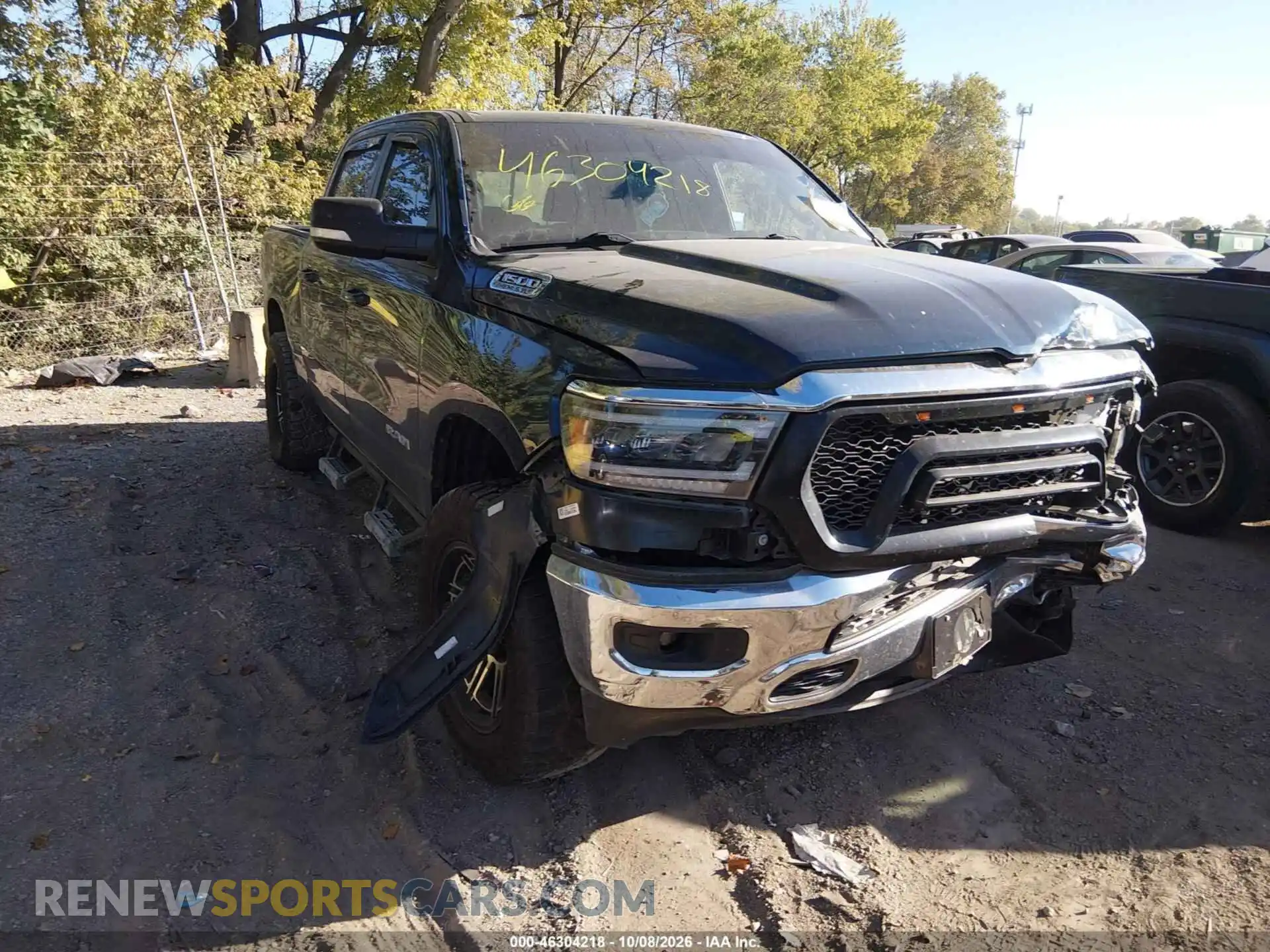 1 Photograph of a damaged car 1C6SRFFT6MN566604 RAM 1500 2021