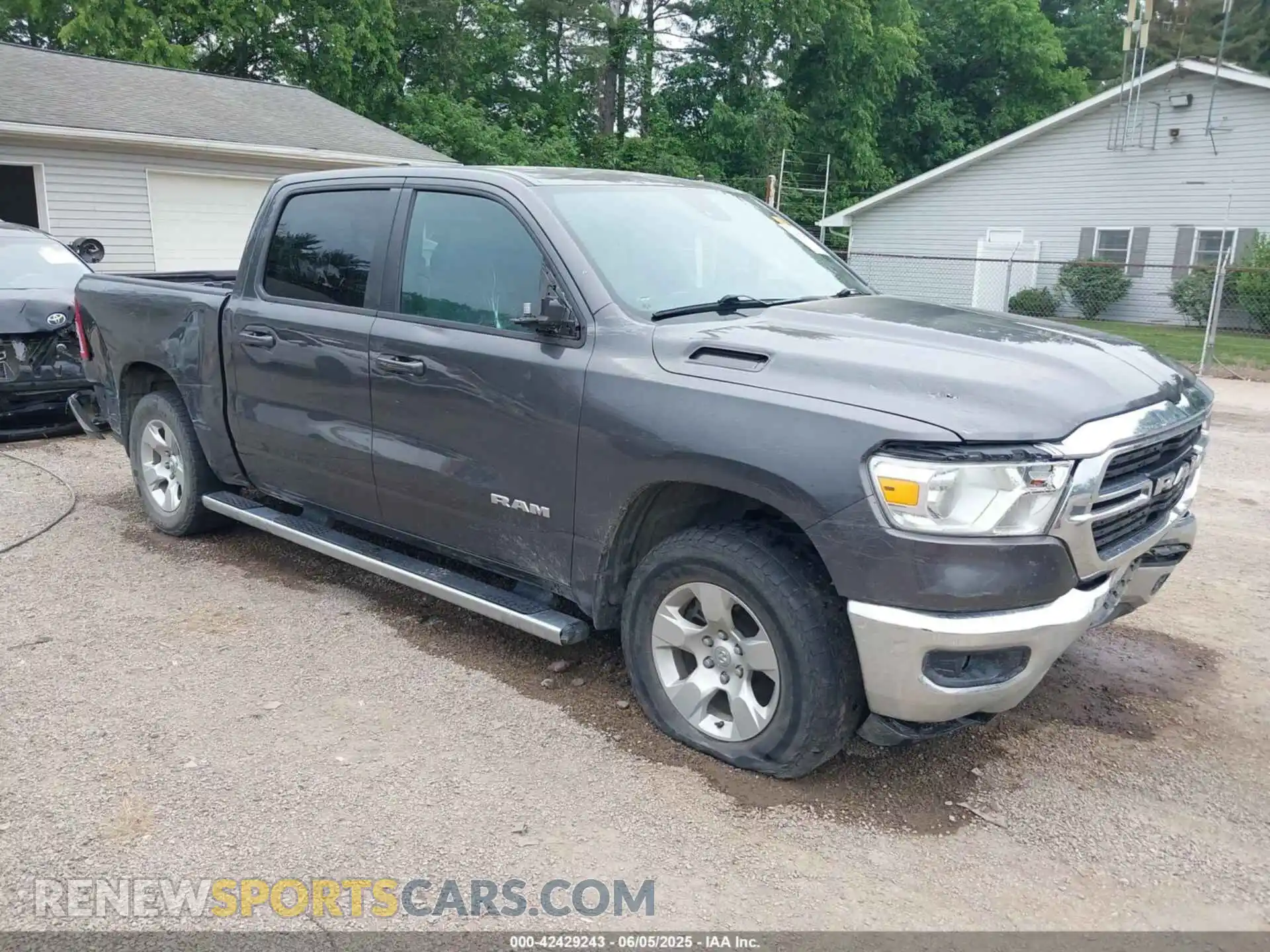 1 Photograph of a damaged car 1C6SRFFT6MN646291 RAM 1500 2021