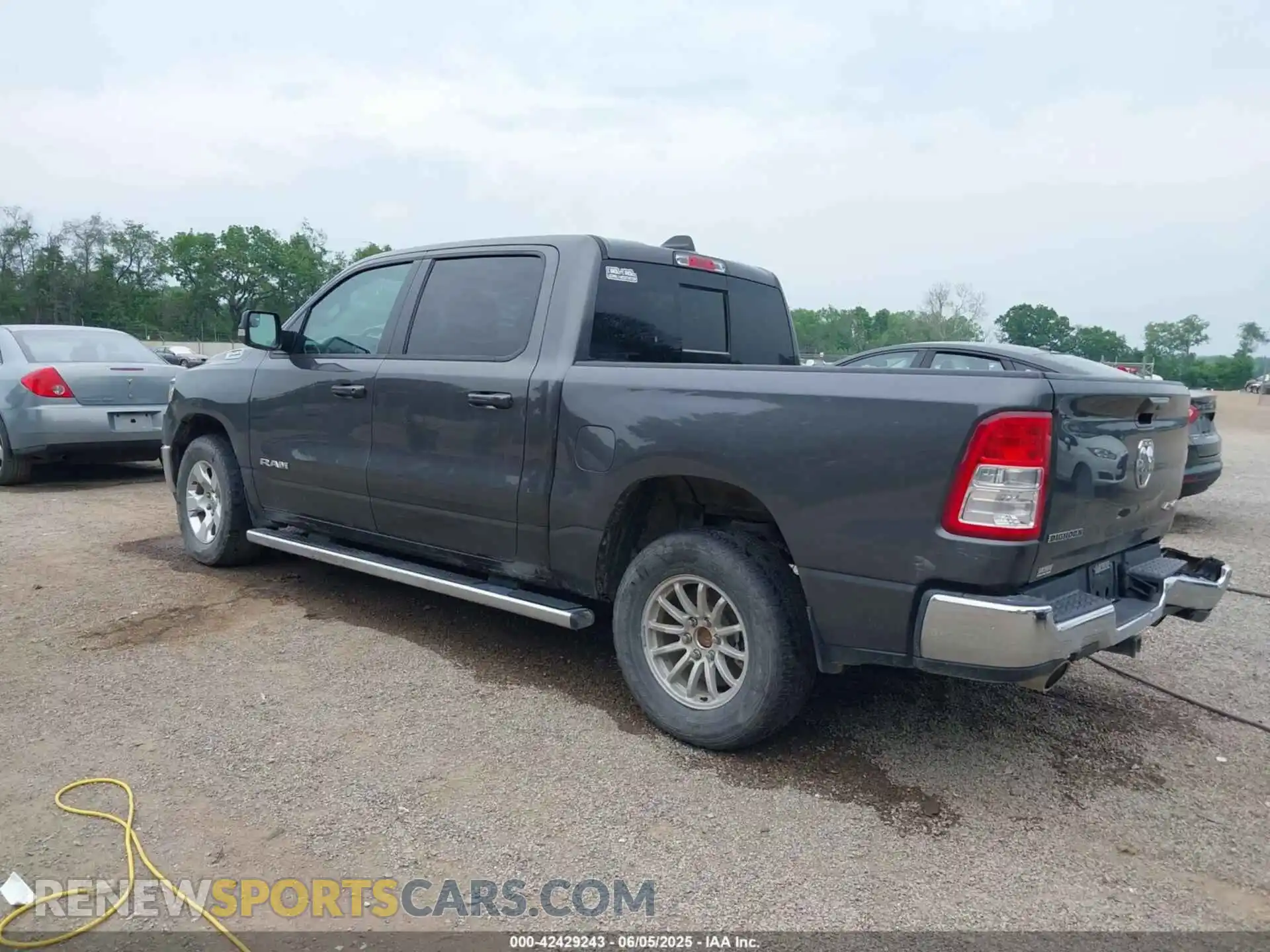 3 Photograph of a damaged car 1C6SRFFT6MN646291 RAM 1500 2021