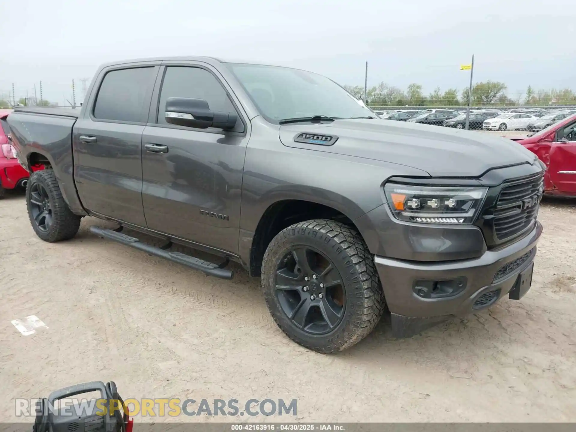 1 Photograph of a damaged car 1C6SRFFT6MN649823 RAM 1500 2021