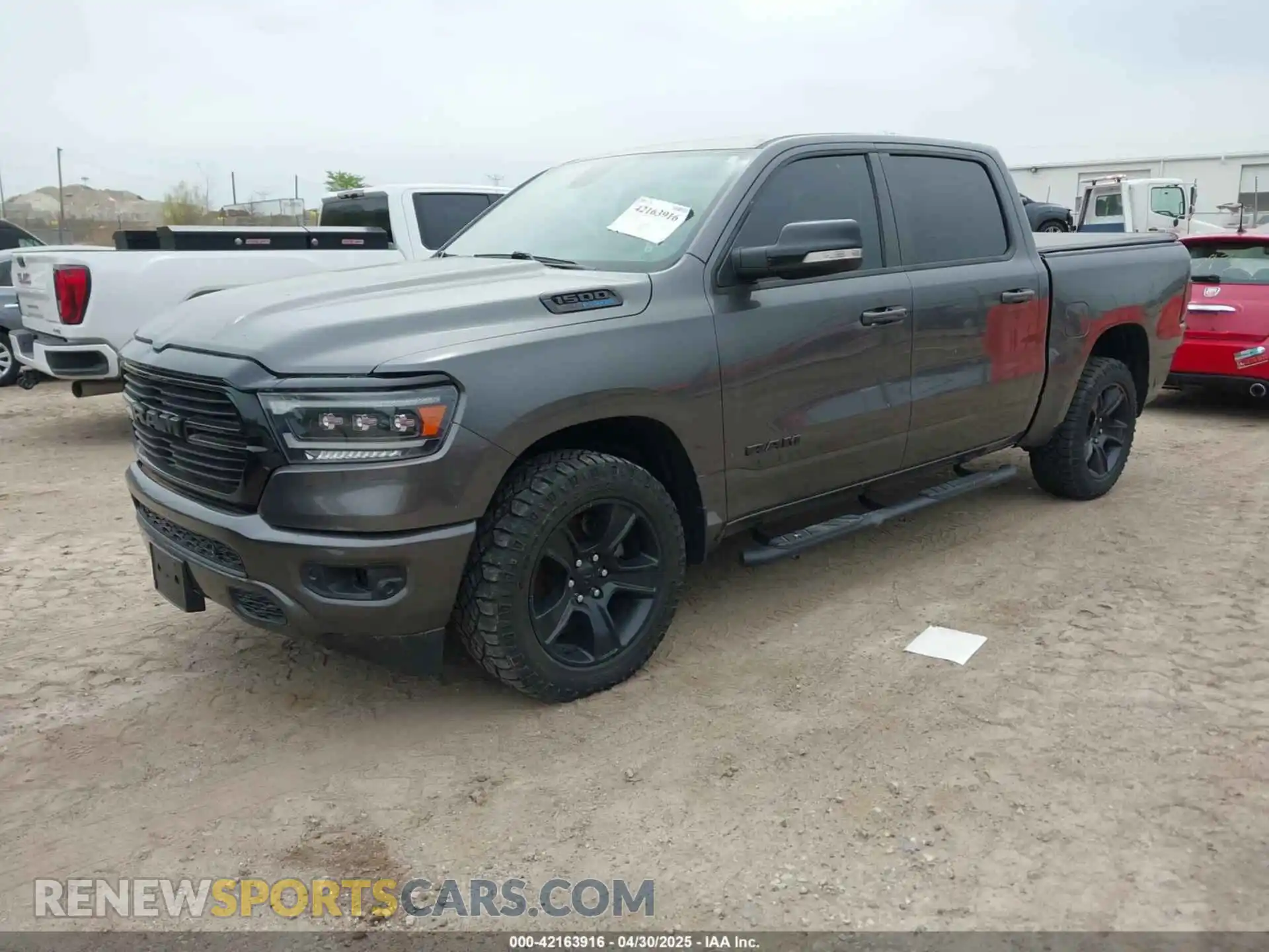 2 Photograph of a damaged car 1C6SRFFT6MN649823 RAM 1500 2021