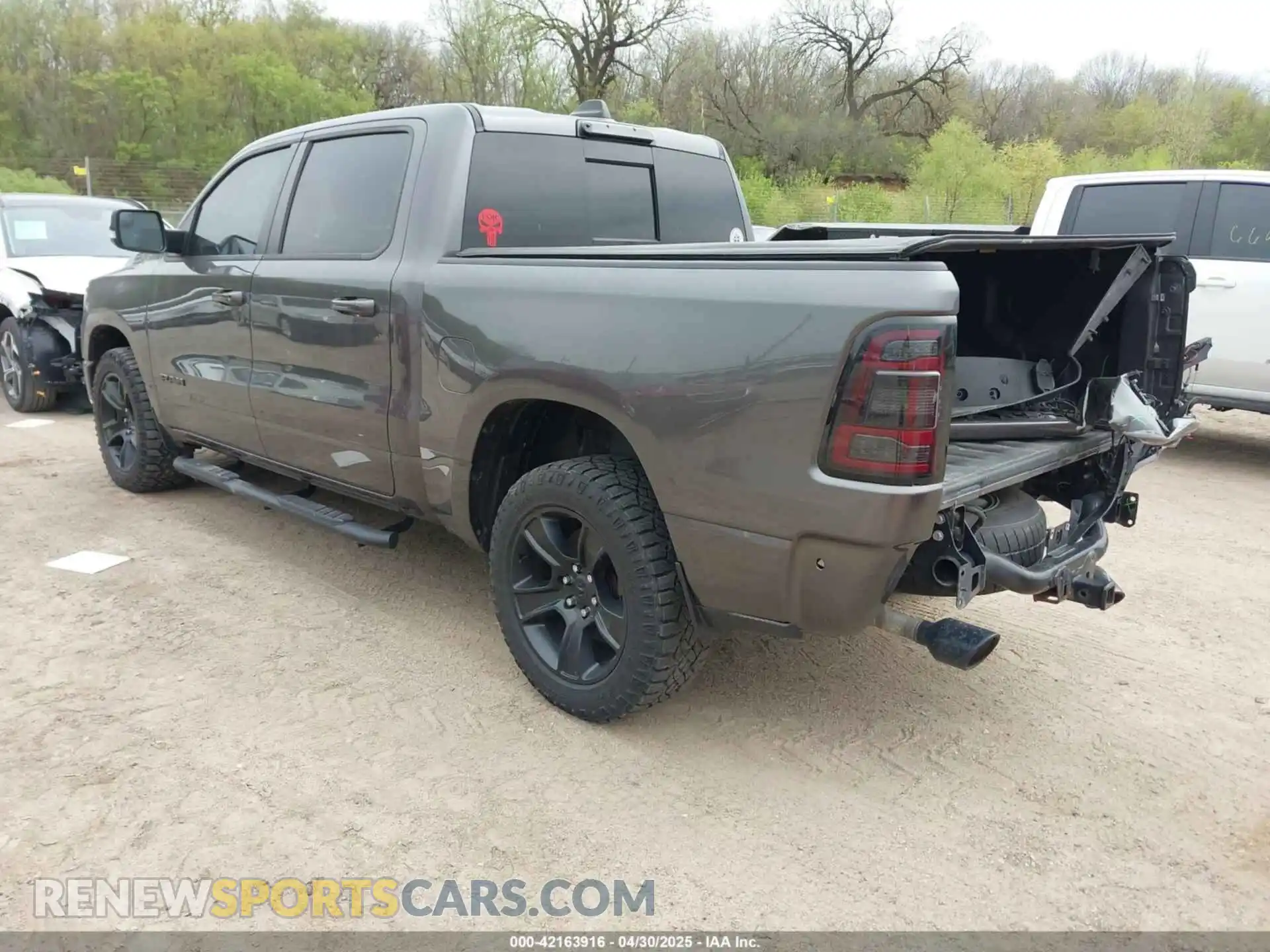 3 Photograph of a damaged car 1C6SRFFT6MN649823 RAM 1500 2021