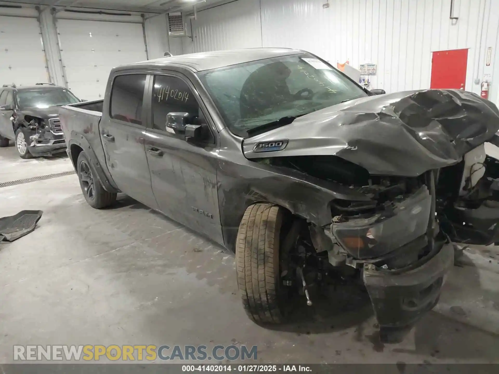 1 Photograph of a damaged car 1C6SRFFT6MN675158 RAM 1500 2021