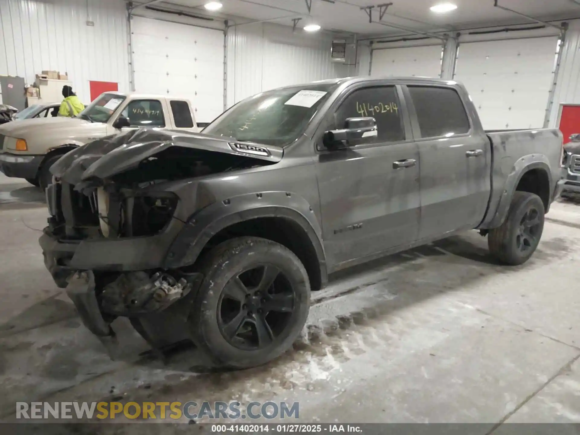 2 Photograph of a damaged car 1C6SRFFT6MN675158 RAM 1500 2021