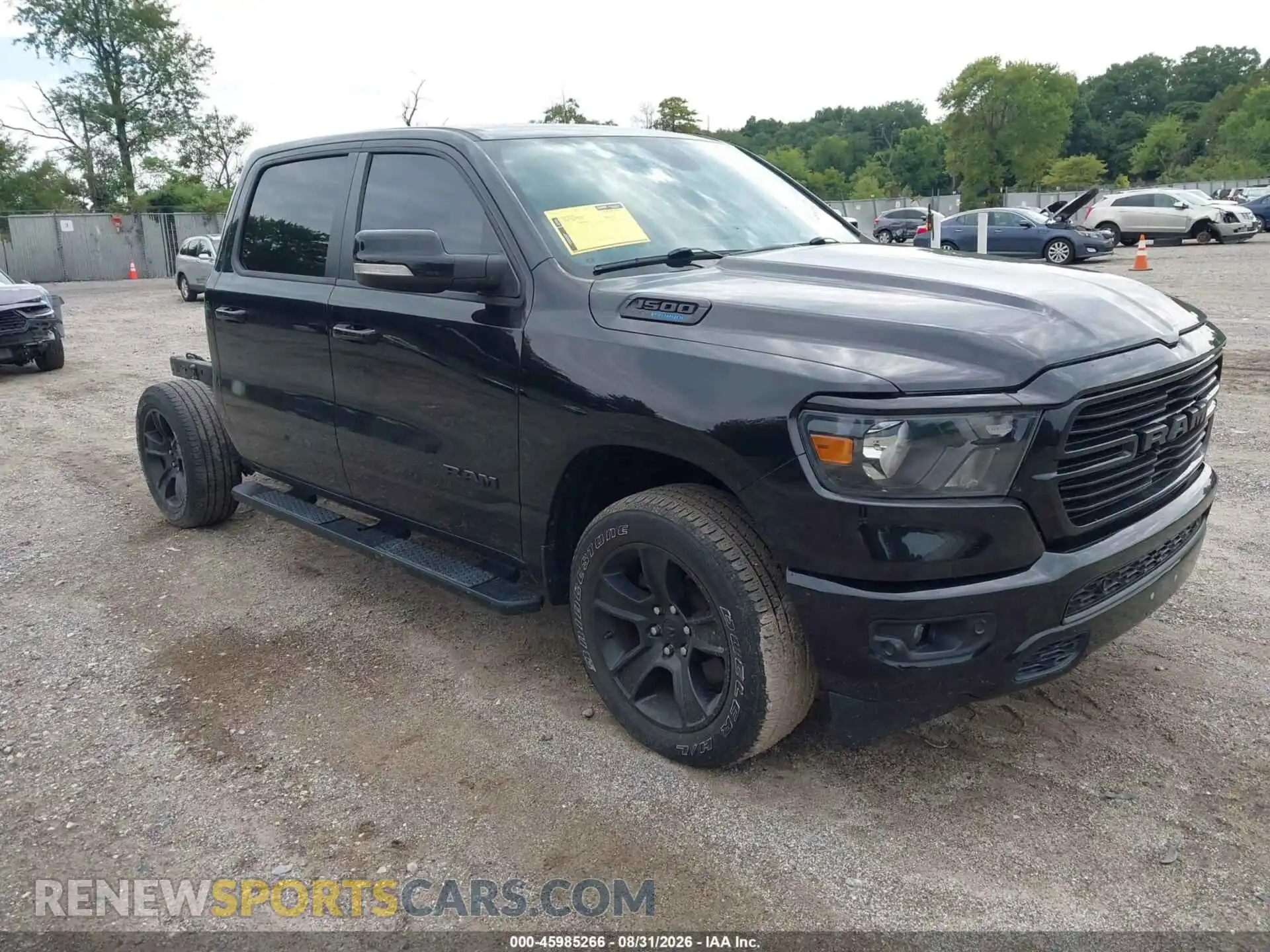 1 Photograph of a damaged car 1C6SRFFT6MN678819 RAM 1500 2021