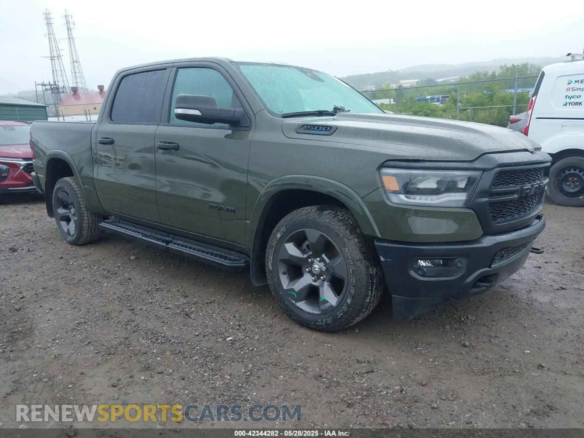 1 Photograph of a damaged car 1C6SRFFT6MN695393 RAM 1500 2021