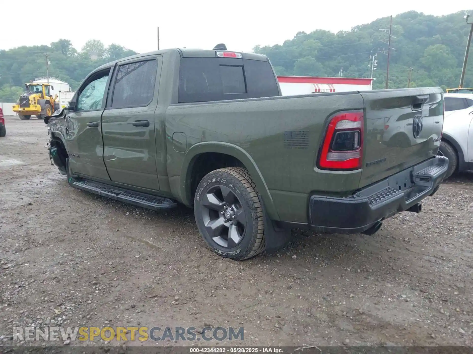 3 Photograph of a damaged car 1C6SRFFT6MN695393 RAM 1500 2021