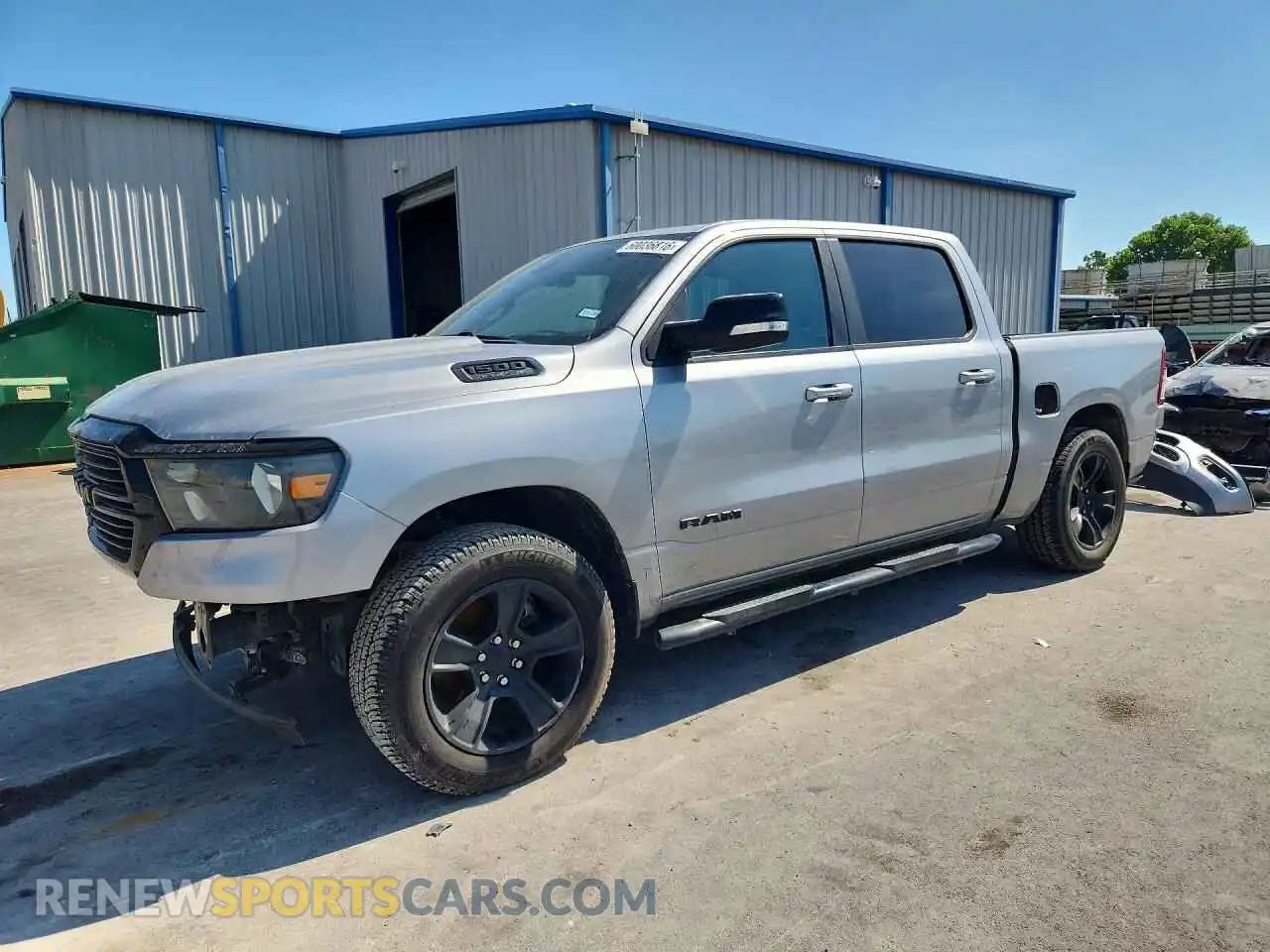 1 Photograph of a damaged car 1C6SRFFT6MN730109 RAM 1500 2021