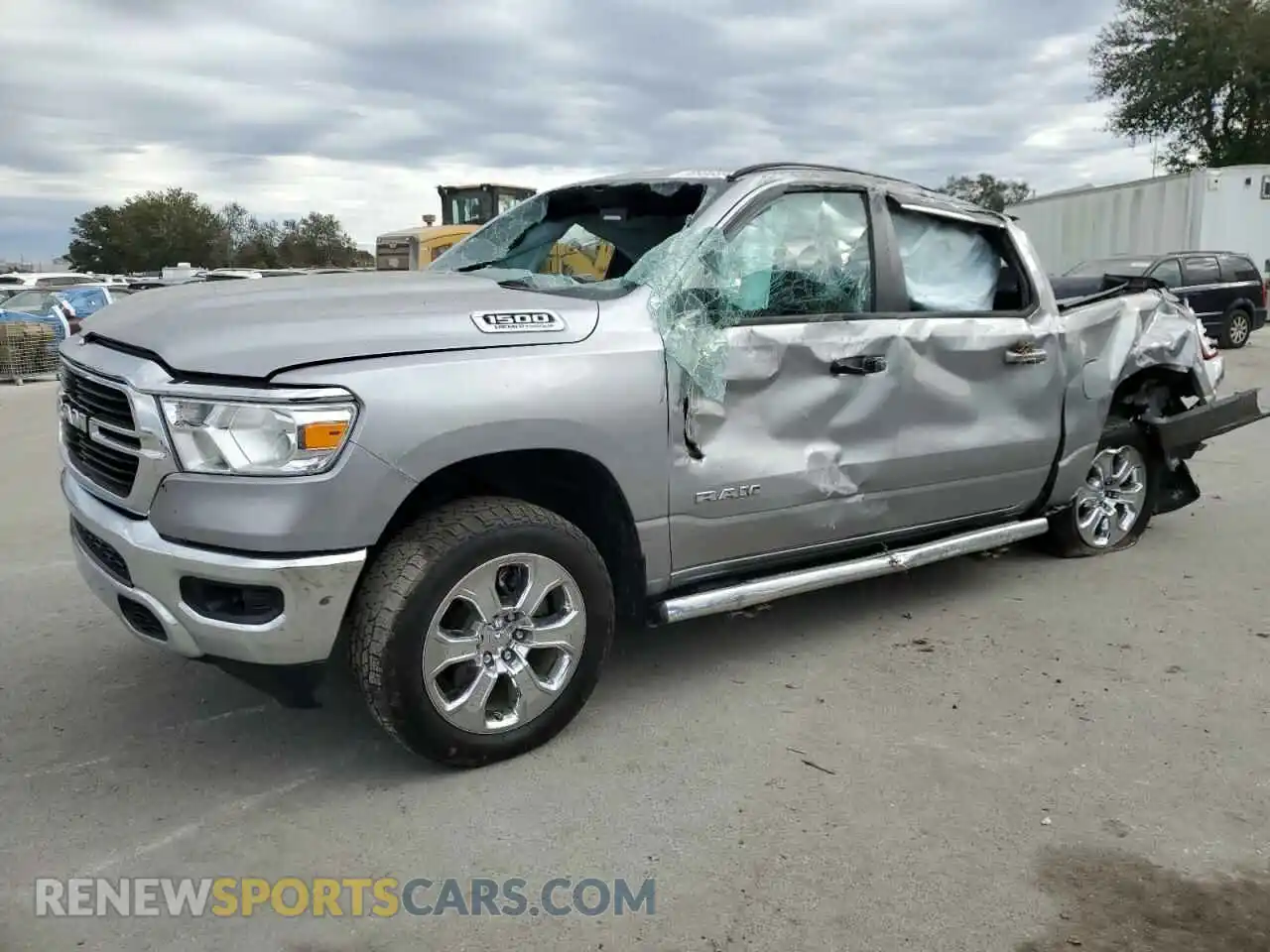 1 Photograph of a damaged car 1C6SRFFT6MN770187 RAM 1500 2021