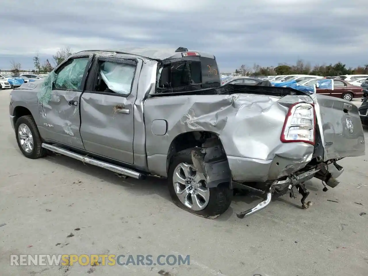 2 Photograph of a damaged car 1C6SRFFT6MN770187 RAM 1500 2021