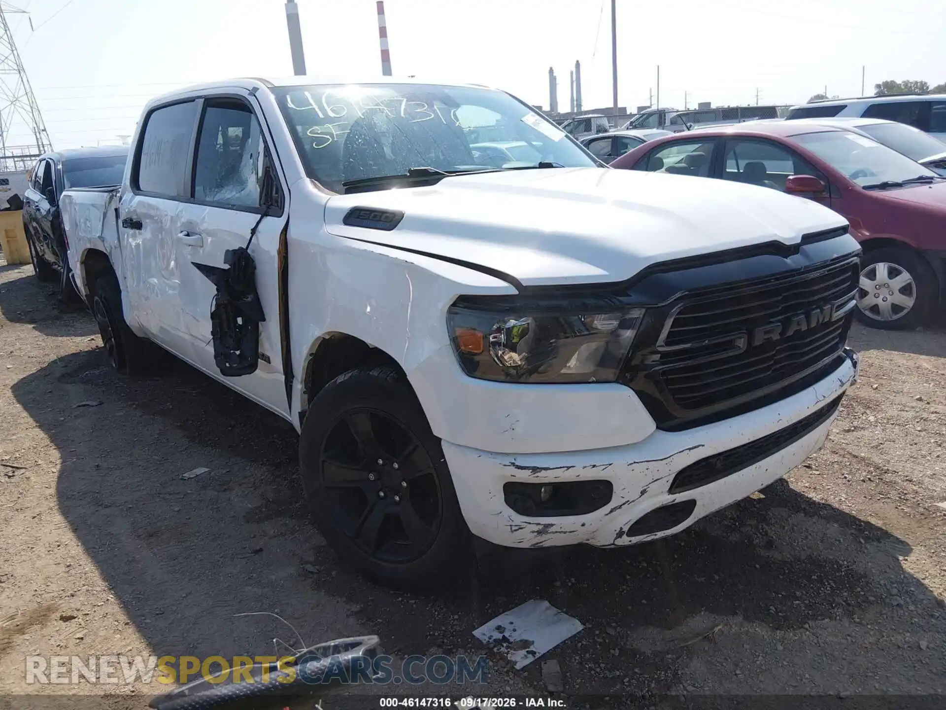 1 Photograph of a damaged car 1C6SRFFT7MN516827 RAM 1500 2021