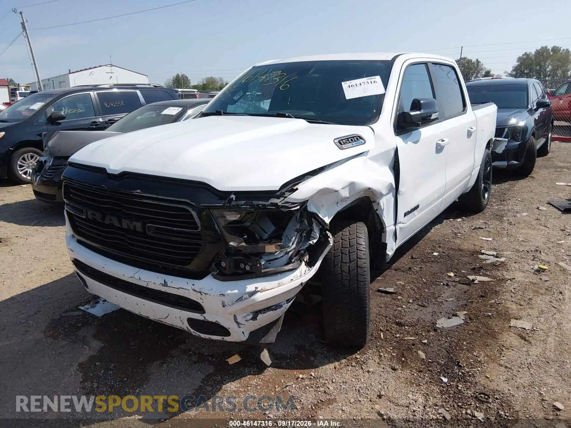 2 Photograph of a damaged car 1C6SRFFT7MN516827 RAM 1500 2021