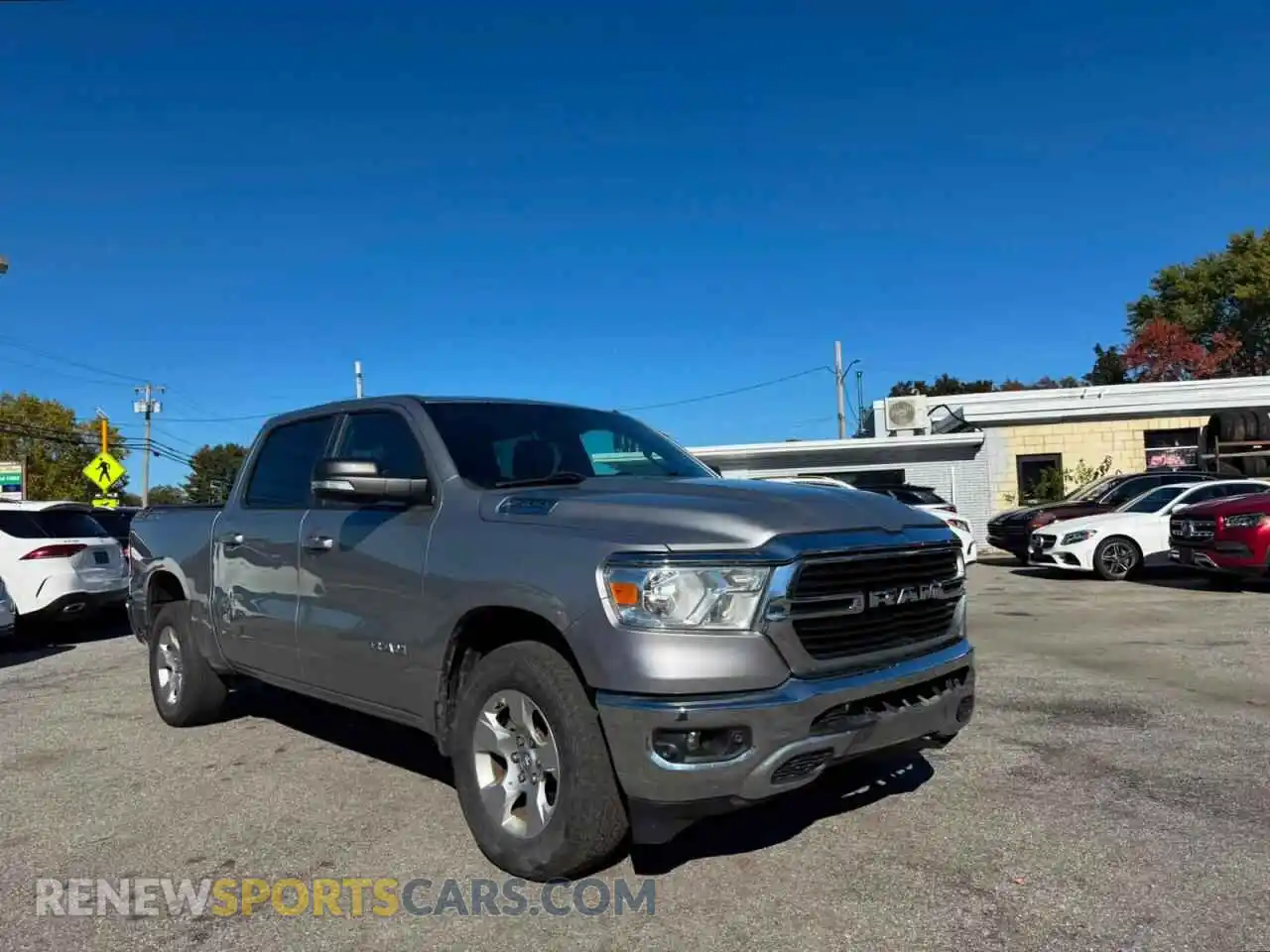 1 Photograph of a damaged car 1C6SRFFT7MN540349 RAM 1500 2021