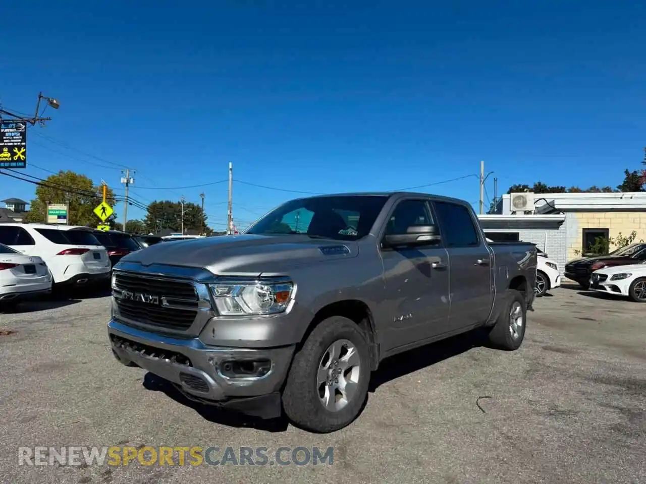 2 Photograph of a damaged car 1C6SRFFT7MN540349 RAM 1500 2021
