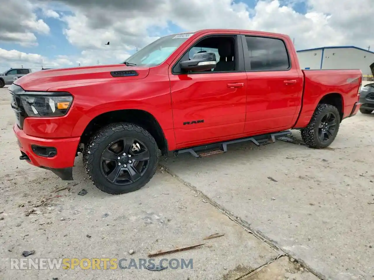 1 Photograph of a damaged car 1C6SRFFT7MN565901 RAM 1500 2021