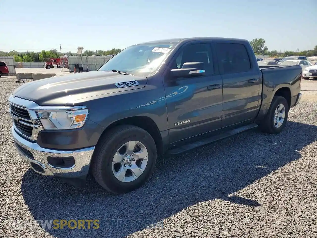 1 Photograph of a damaged car 1C6SRFFT7MN633002 RAM 1500 2021