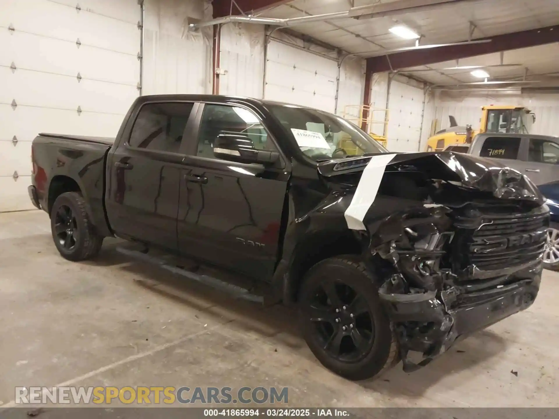1 Photograph of a damaged car 1C6SRFFT7MN641634 RAM 1500 2021