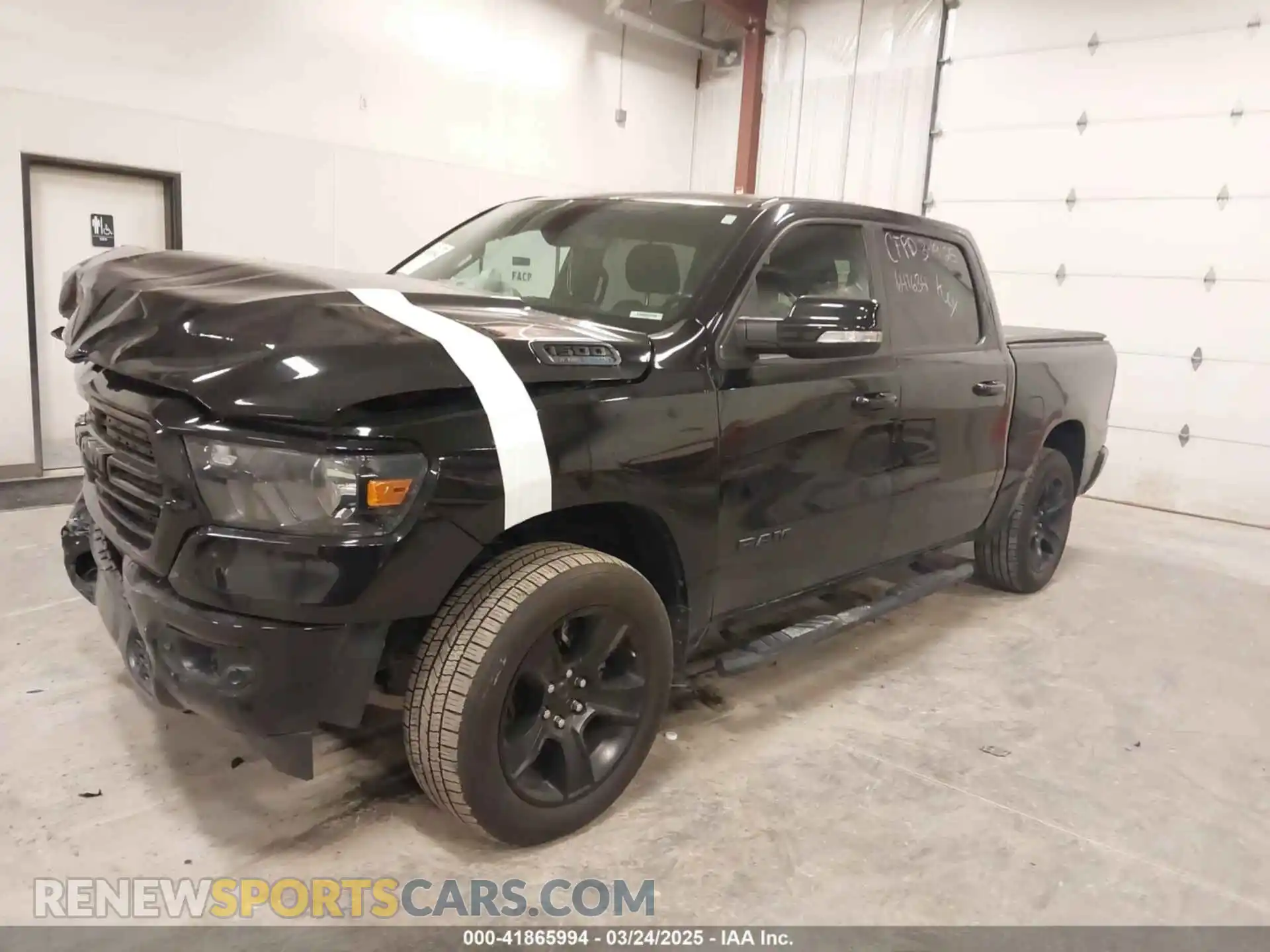 2 Photograph of a damaged car 1C6SRFFT7MN641634 RAM 1500 2021