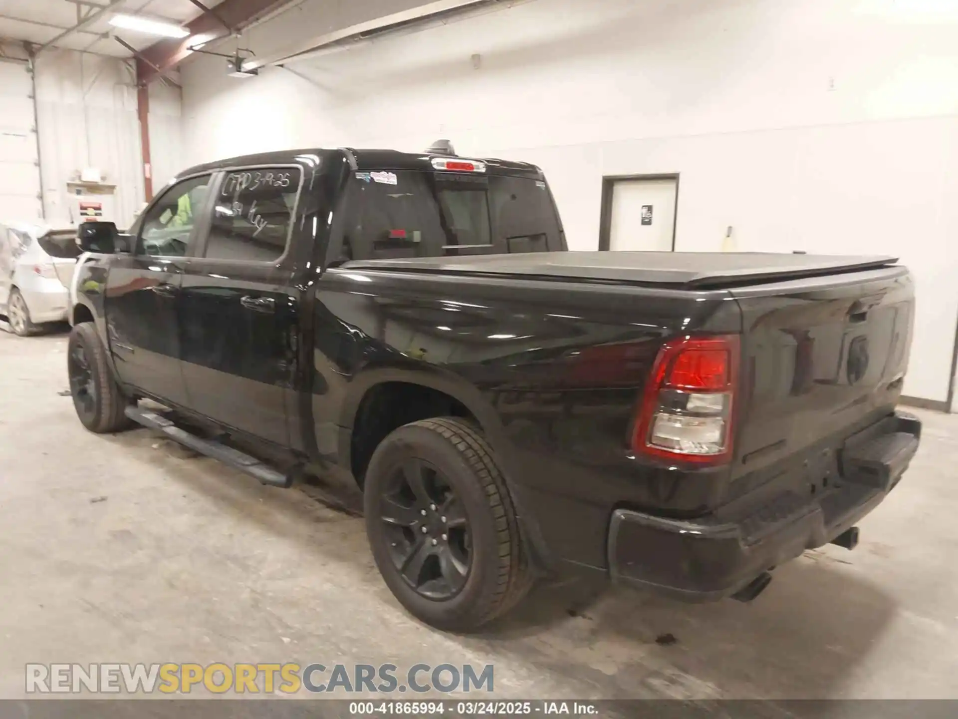 3 Photograph of a damaged car 1C6SRFFT7MN641634 RAM 1500 2021