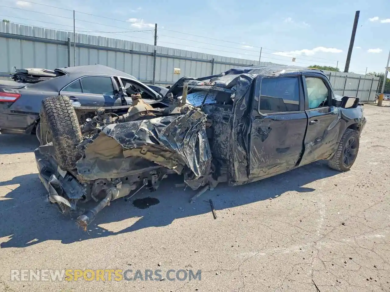 3 Photograph of a damaged car 1C6SRFFT7MN676383 RAM 1500 2021