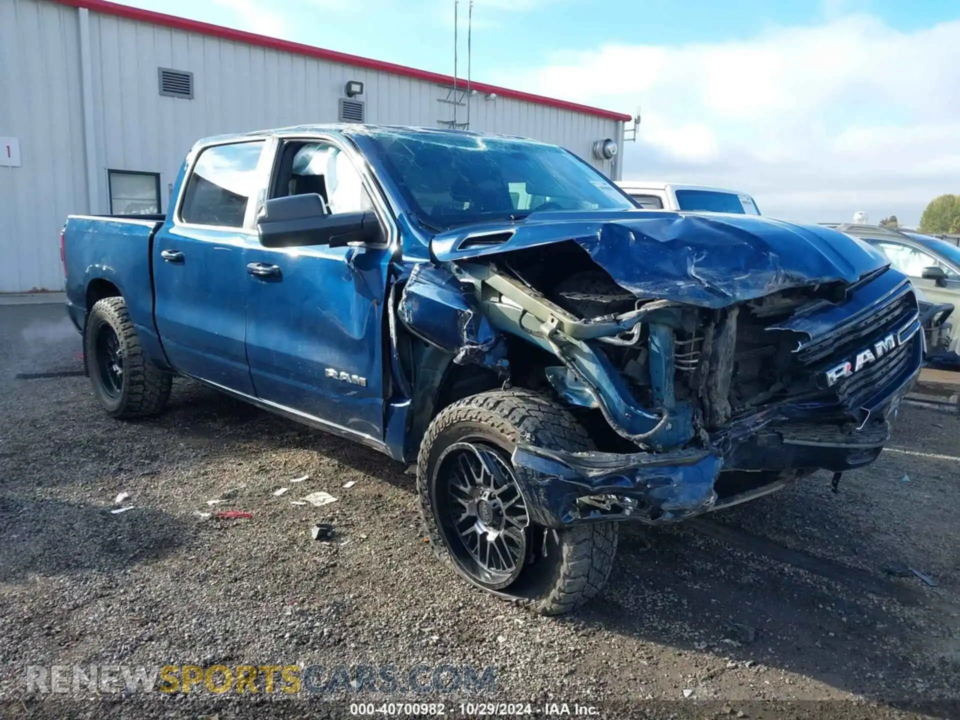 1 Photograph of a damaged car 1C6SRFFT7MN717949 RAM 1500 2021