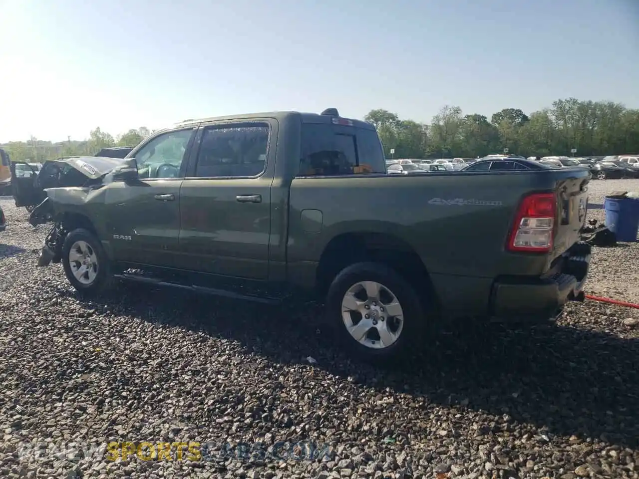 2 Photograph of a damaged car 1C6SRFFT8MN504931 RAM 1500 2021