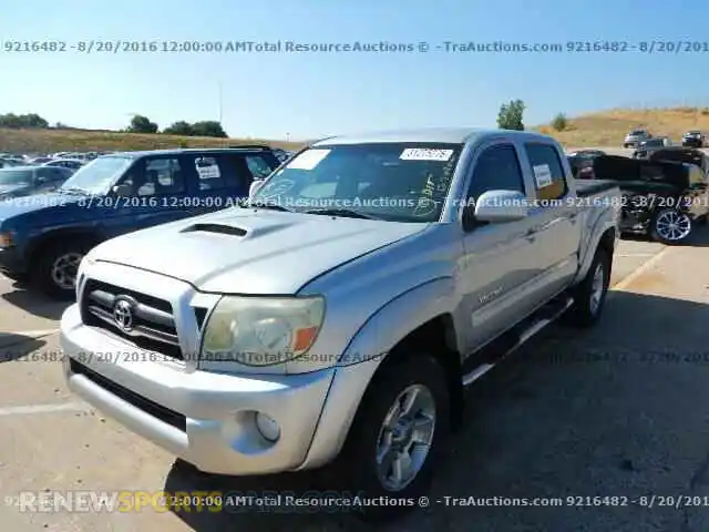 1 Photograph of a damaged car 1C6SRFFT8MN536813 RAM 1500 2021
