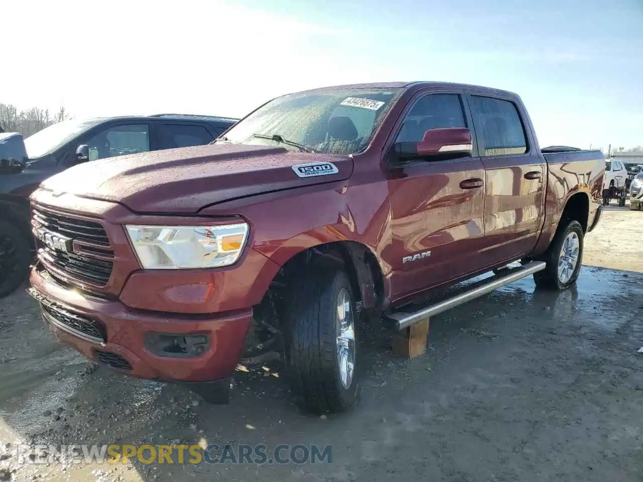 1 Photograph of a damaged car 1C6SRFFT8MN554051 RAM 1500 2021