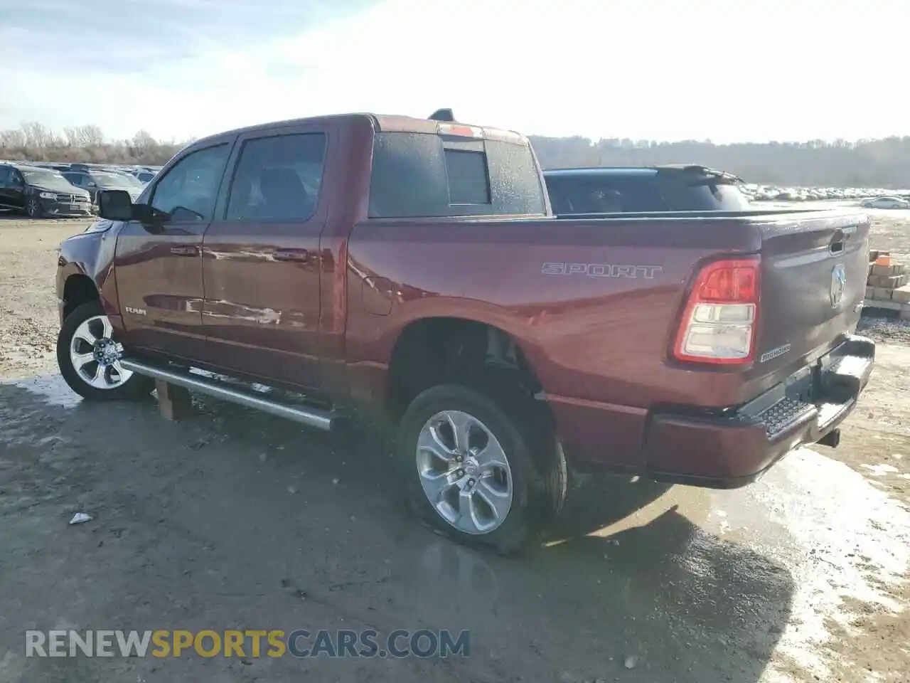 2 Photograph of a damaged car 1C6SRFFT8MN554051 RAM 1500 2021