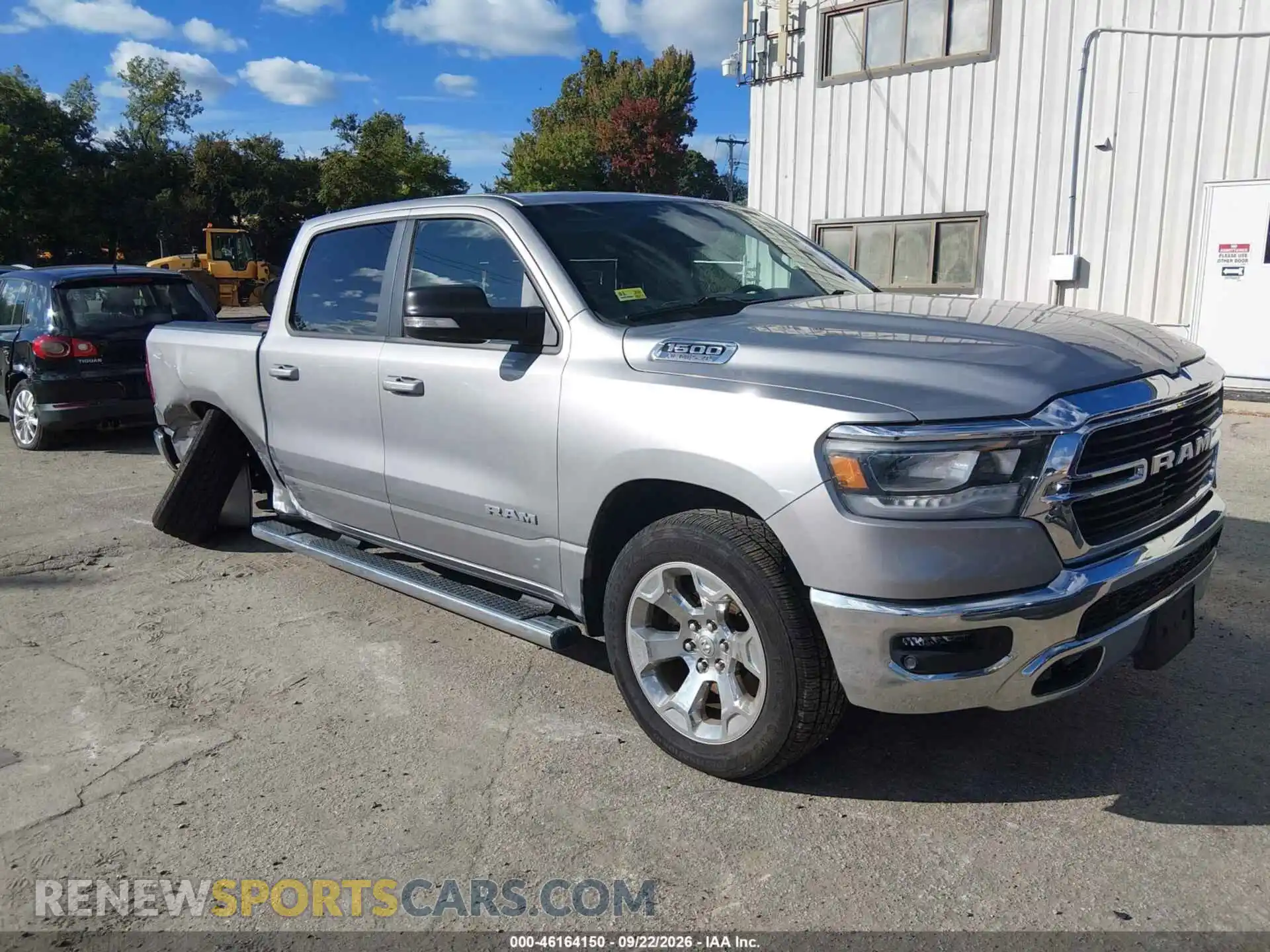 1 Photograph of a damaged car 1C6SRFFT8MN567656 RAM 1500 2021