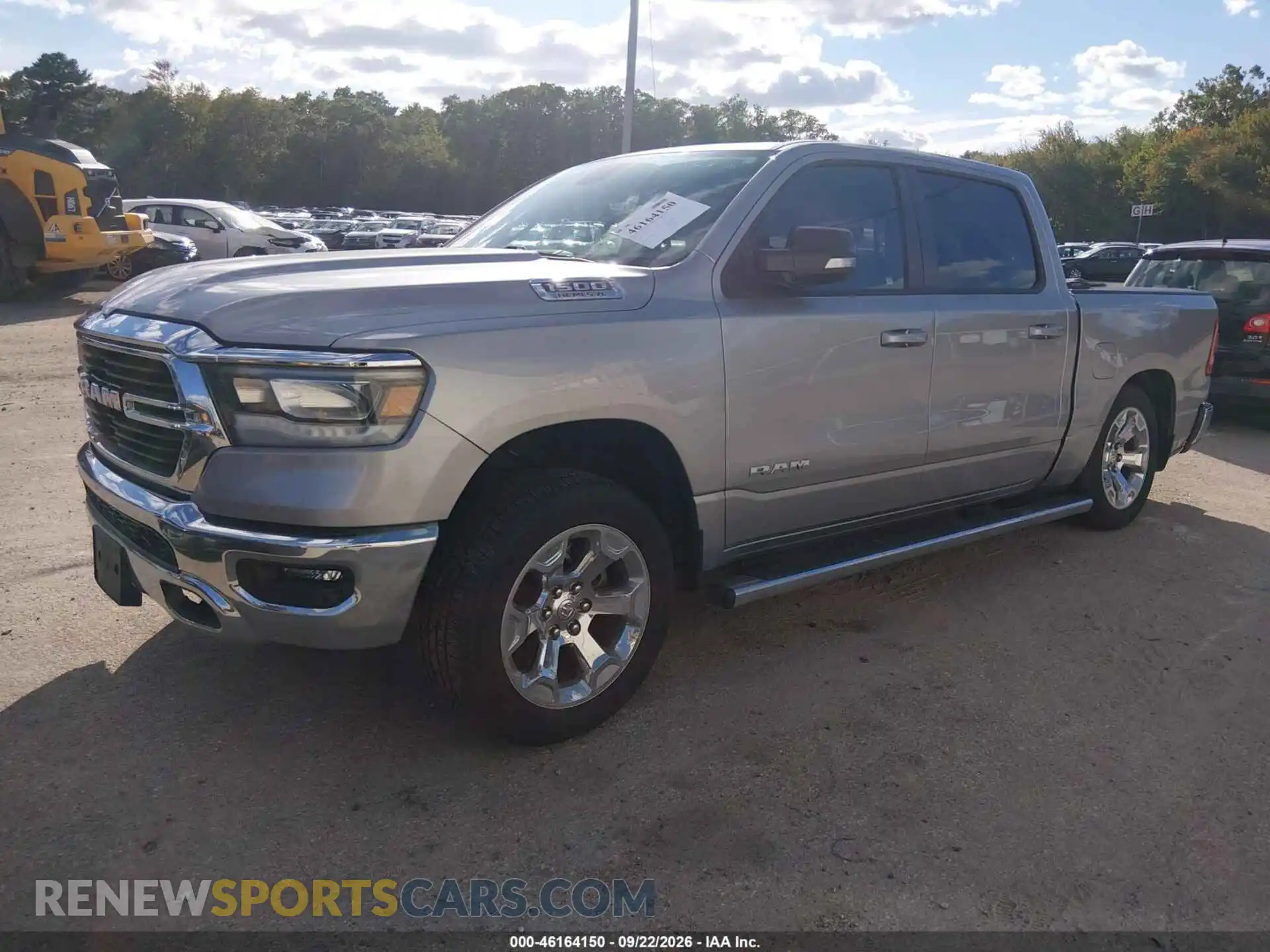 2 Photograph of a damaged car 1C6SRFFT8MN567656 RAM 1500 2021