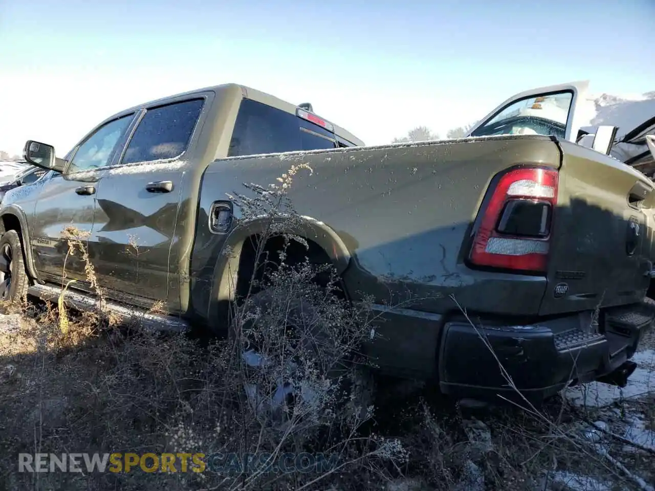 2 Photograph of a damaged car 1C6SRFFT8MN669538 RAM 1500 2021