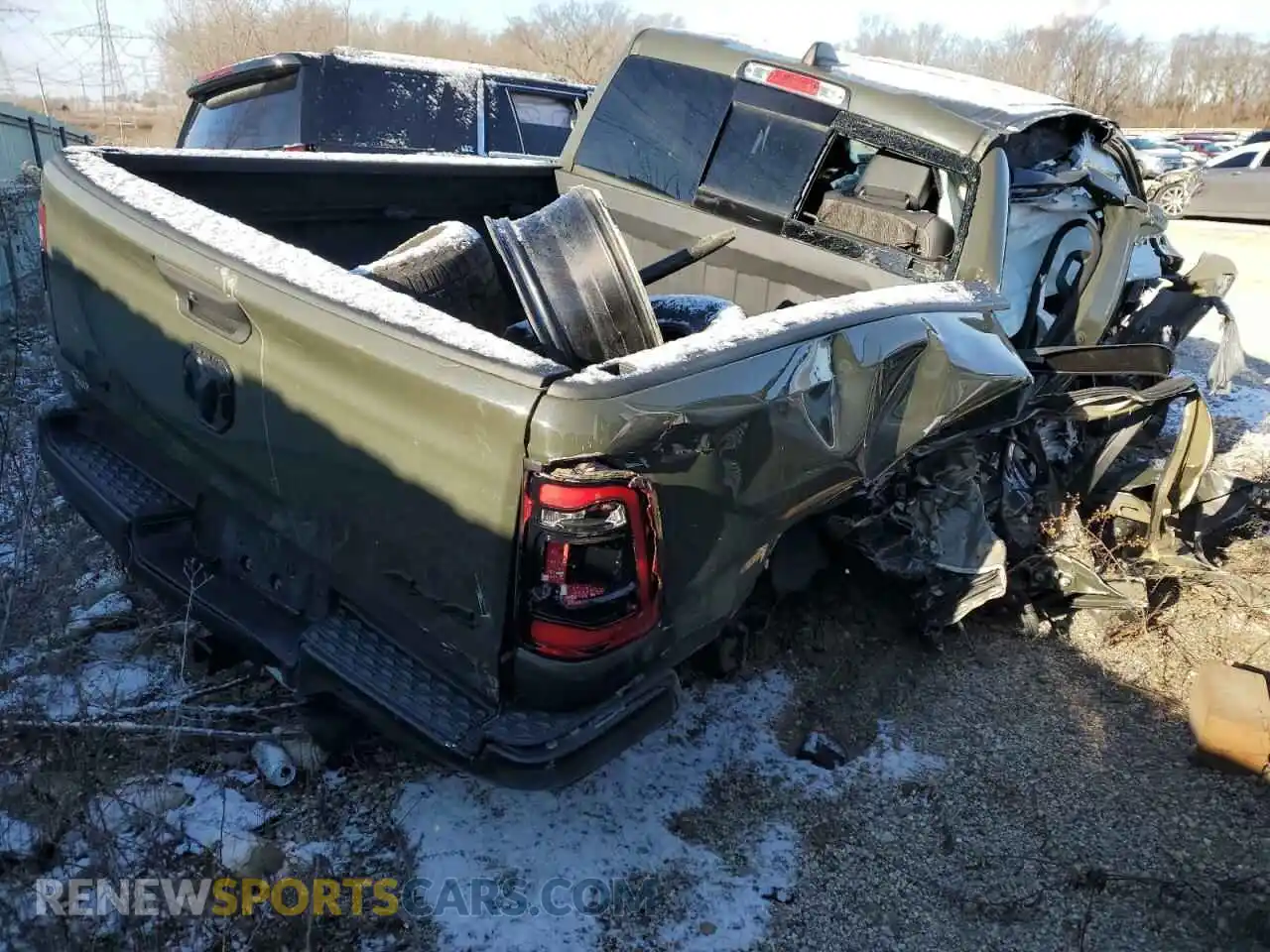 3 Photograph of a damaged car 1C6SRFFT8MN669538 RAM 1500 2021