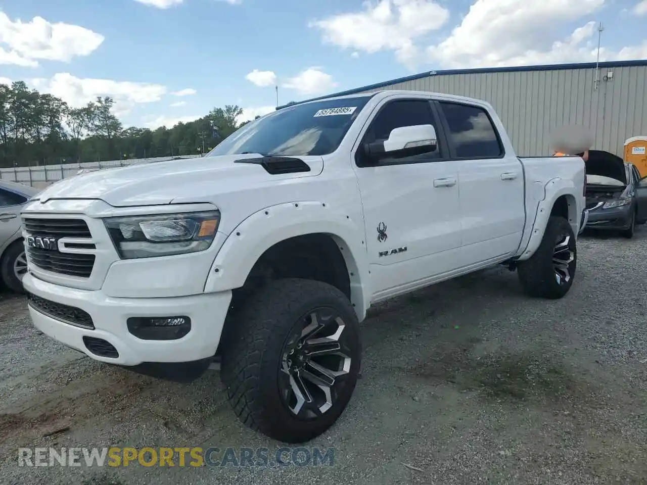 1 Photograph of a damaged car 1C6SRFFT8MN761491 RAM 1500 2021