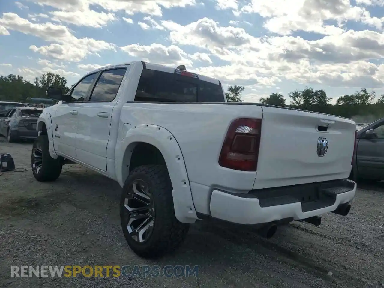 2 Photograph of a damaged car 1C6SRFFT8MN761491 RAM 1500 2021