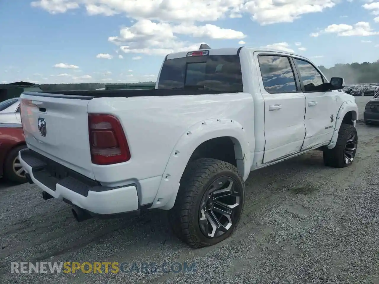 3 Photograph of a damaged car 1C6SRFFT8MN761491 RAM 1500 2021