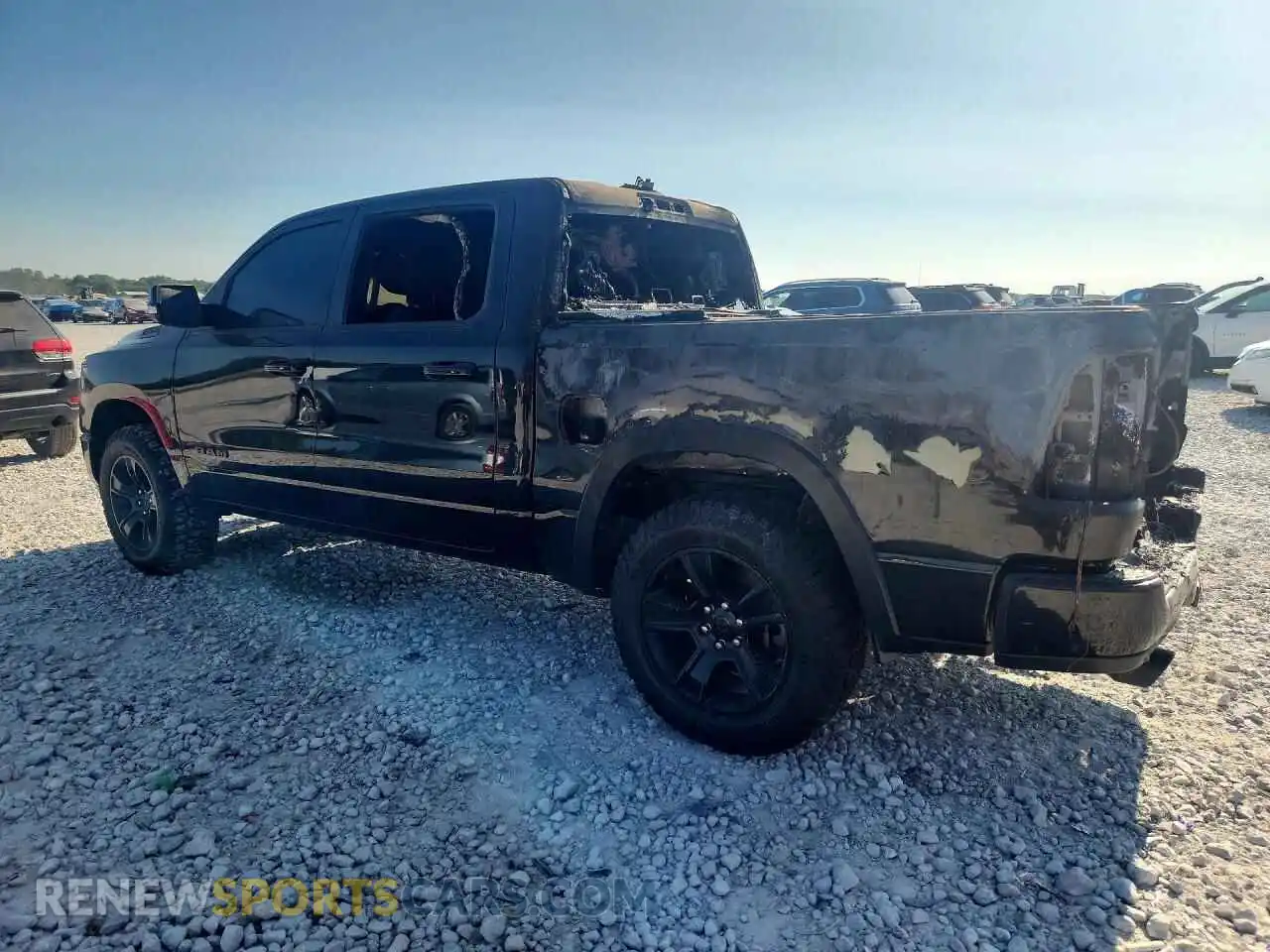 2 Photograph of a damaged car 1C6SRFFT9MN598916 RAM 1500 2021