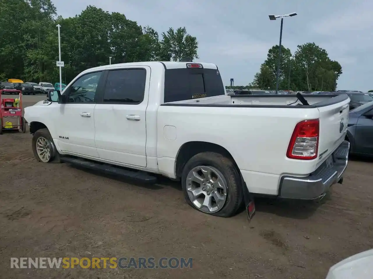2 Photograph of a damaged car 1C6SRFFT9MN778929 RAM 1500 2021