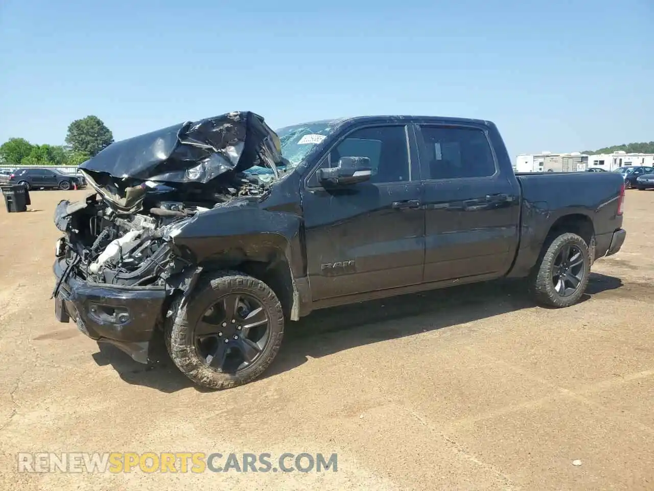 1 Photograph of a damaged car 1C6SRFFTXMN570655 RAM 1500 2021