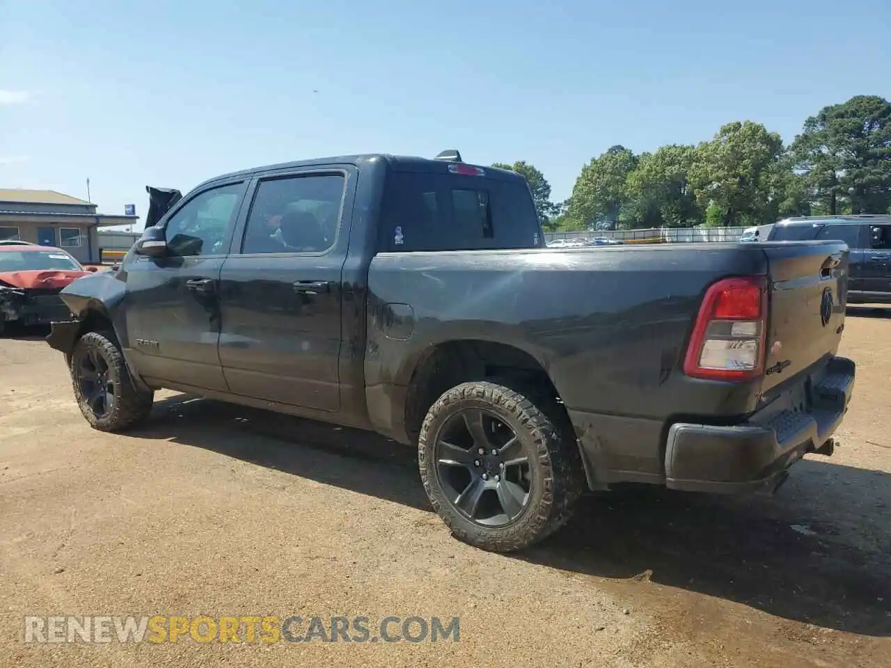 2 Photograph of a damaged car 1C6SRFFTXMN570655 RAM 1500 2021