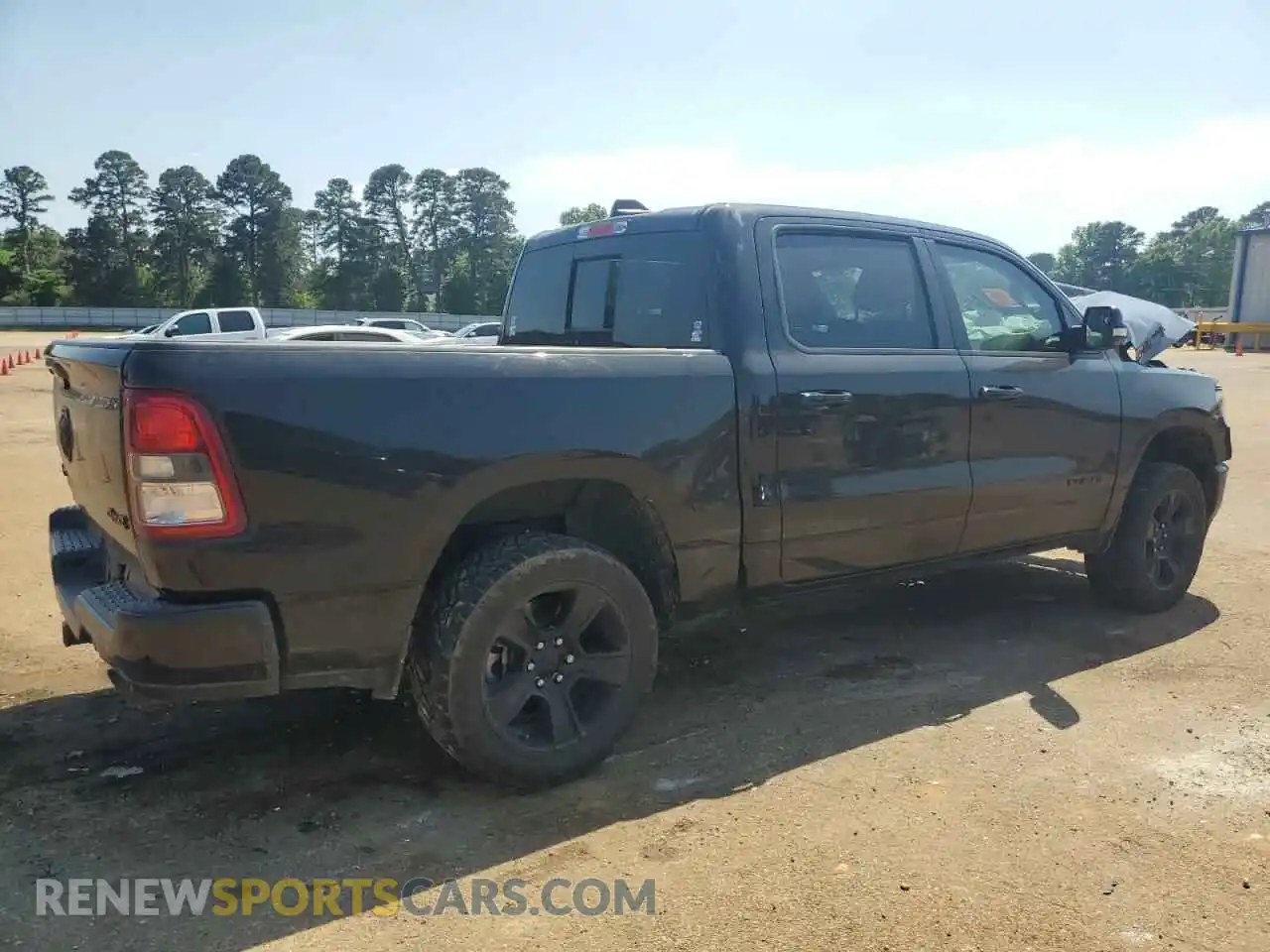 3 Photograph of a damaged car 1C6SRFFTXMN570655 RAM 1500 2021
