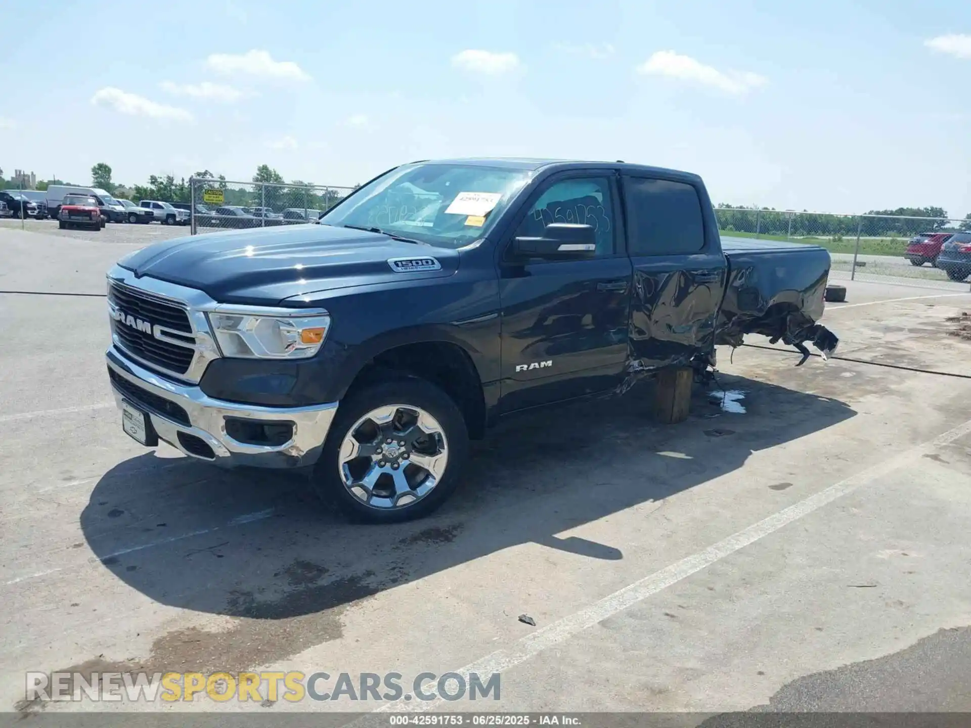 2 Photograph of a damaged car 1C6SRFFTXMN642714 RAM 1500 2021