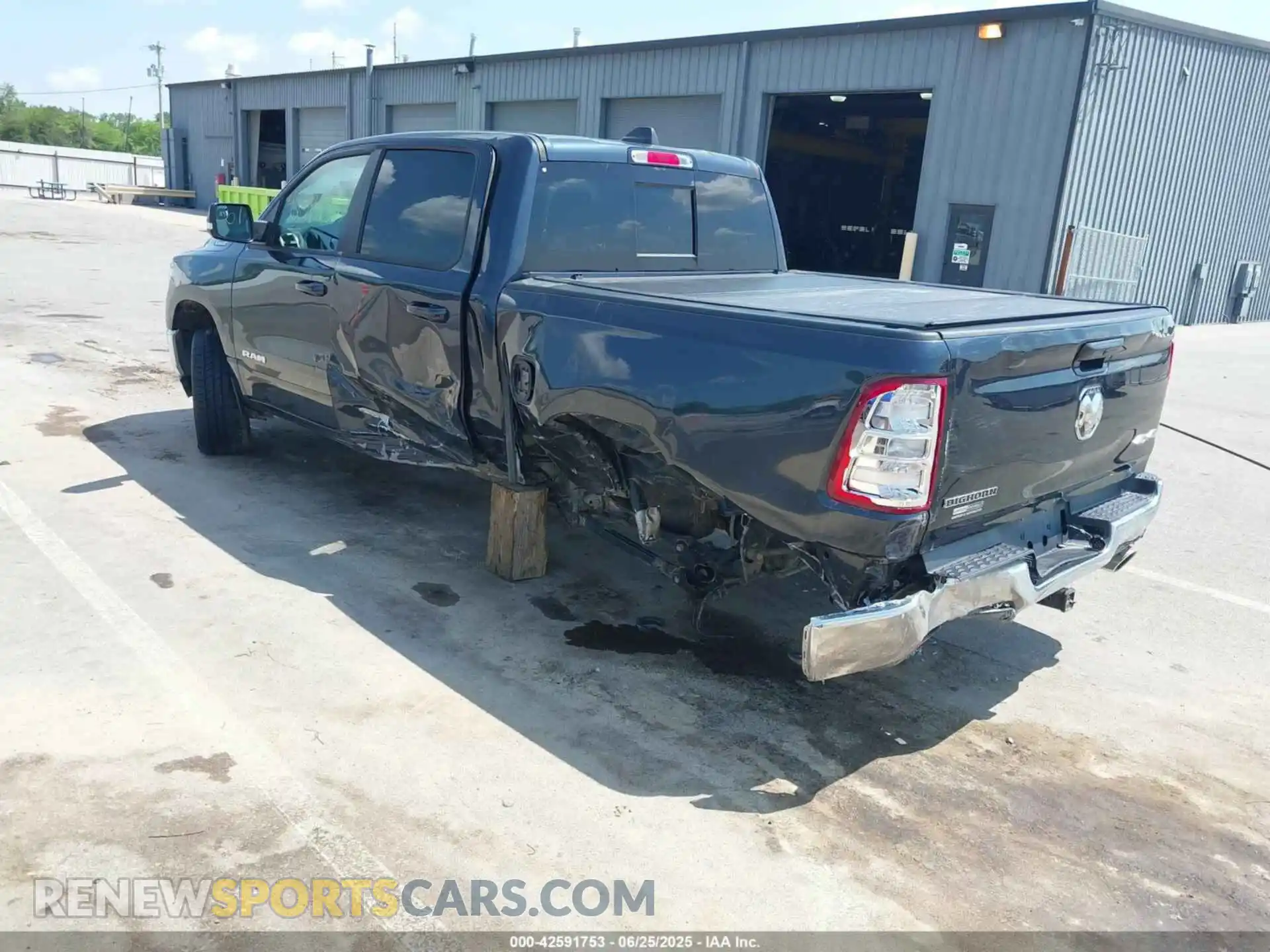 3 Photograph of a damaged car 1C6SRFFTXMN642714 RAM 1500 2021