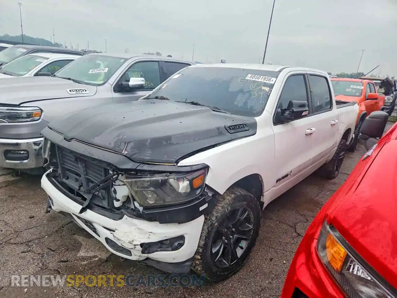 1 Photograph of a damaged car 1C6SRFFTXMN651316 RAM 1500 2021
