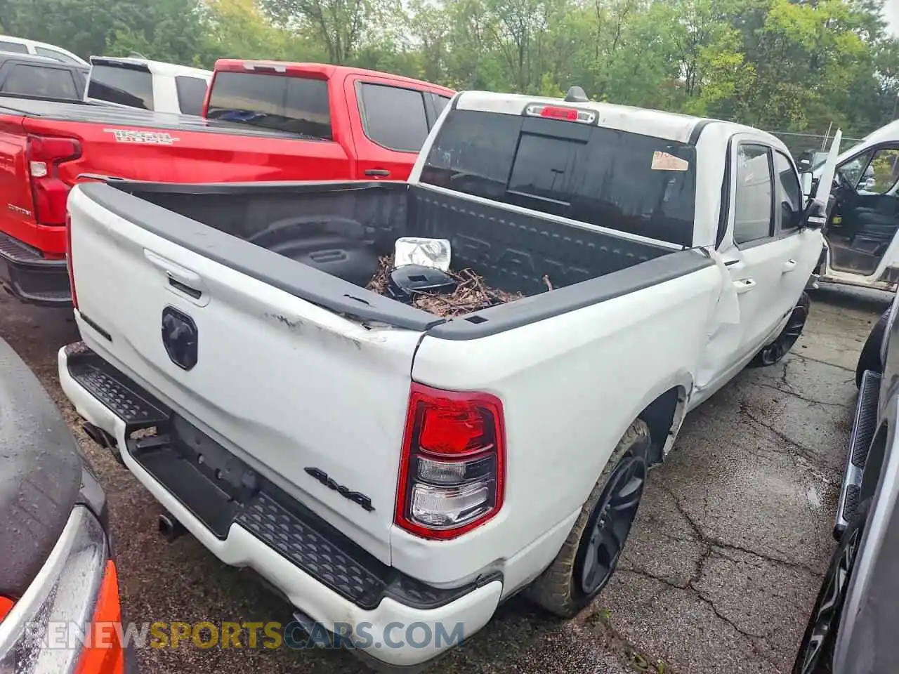 3 Photograph of a damaged car 1C6SRFFTXMN651316 RAM 1500 2021